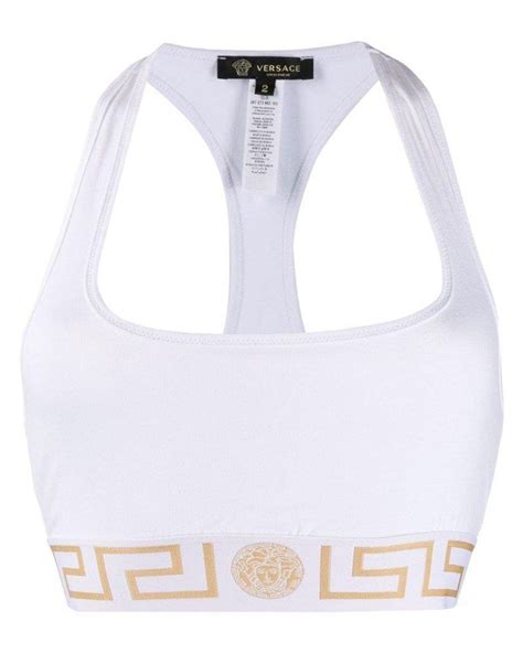 white versace bra|Versace sports bra and leggings.